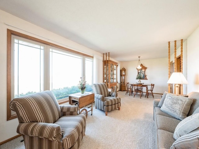 7101 28th Ave, Newhall, IA 52315 - carpeted living room featuring baseboards