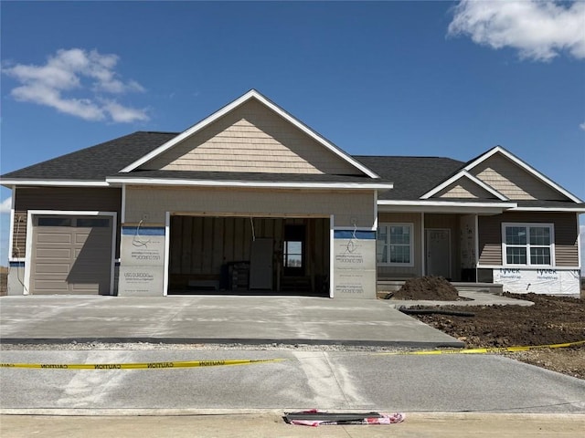 property under construction with a garage and driveway