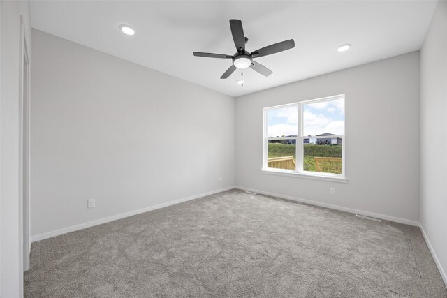 1442 Cardinal Dr, Fairfax, IA 52228 - carpeted empty room featuring a ceiling fan and recessed lighting