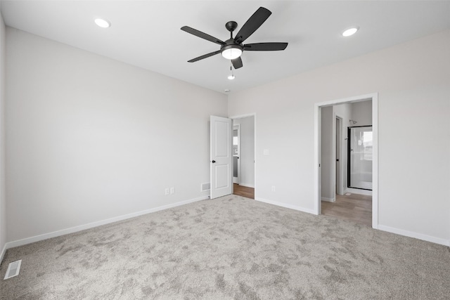 1442 Cardinal Dr, Fairfax, IA 52228 - unfurnished bedroom with carpet floors, recessed lighting, and a ceiling fan