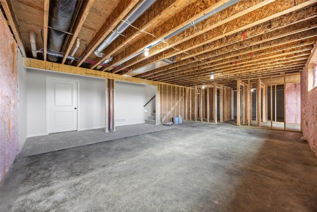 1442 Cardinal Dr, Fairfax, IA 52228 - unfinished below grade area featuring stairs