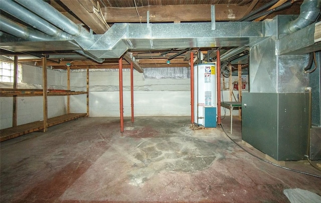 110 SE 12th St, Oelwein, IA 50662 - unfinished basement with heating unit and gas water heater