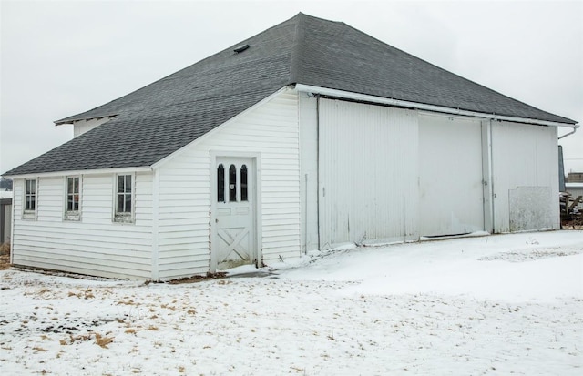 110 SE 12th St, Oelwein, IA 50662 - exterior space featuring a shingled roof