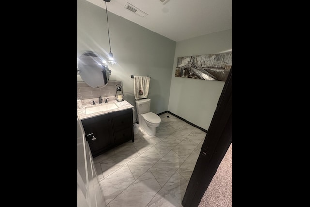 1609 Petrus Dr NE, Cedar Rapids, IA 52402 - half bath with marble finish flooring and vanity