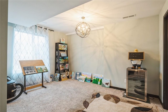 1609 Petrus Dr NE, Cedar Rapids, IA 52402 - rec room featuring carpet flooring, a chandelier, and beverage cooler
