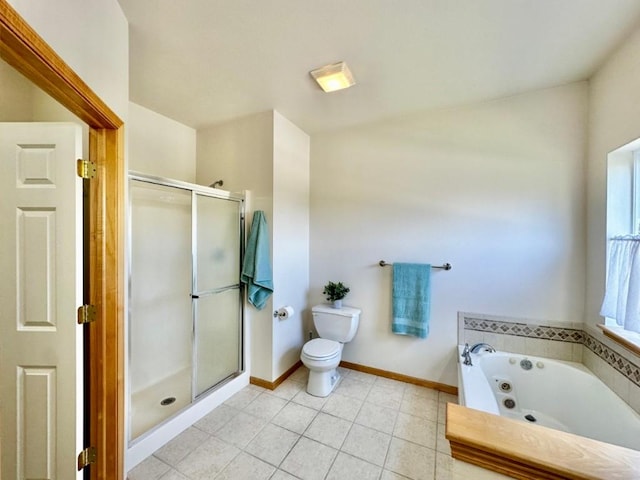 bathroom with a shower stall, tile patterned flooring, toilet, a jetted tub, and baseboards