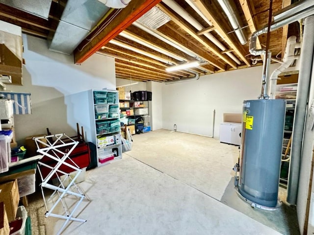 unfinished below grade area featuring water heater