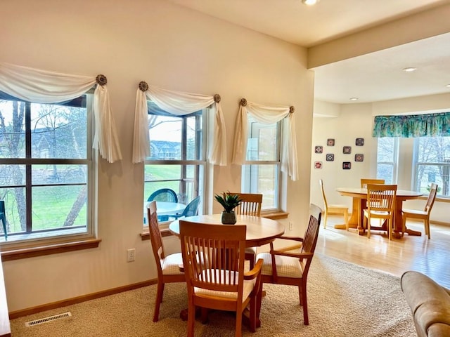 dining space featuring visible vents, baseboards, recessed lighting, and carpet flooring