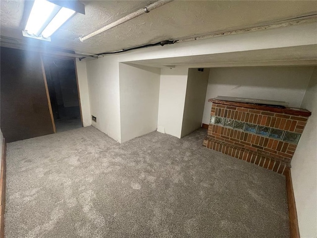 finished basement featuring carpet floors