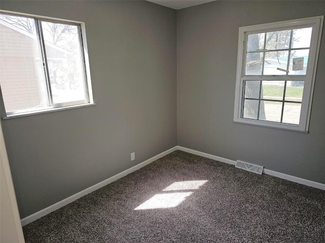 1025 Pawnee Dr NW, Cedar Rapids, IA 52405 - carpeted empty room with baseboards