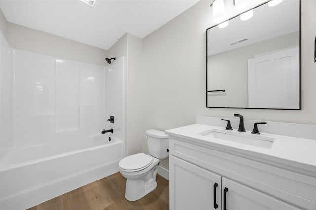 4018 Peridot Dr, Marion, IA 52302 - bathroom featuring vanity, wood finished floors, and bathing tub / shower combination