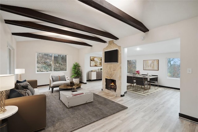 3111 Carroll Dr SE, Cedar Rapids, IA 52403 - living area with wood finished floors, a high end fireplace, and baseboards