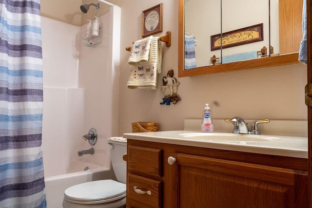 full bath with shower / bathtub combination with curtain, vanity, and toilet