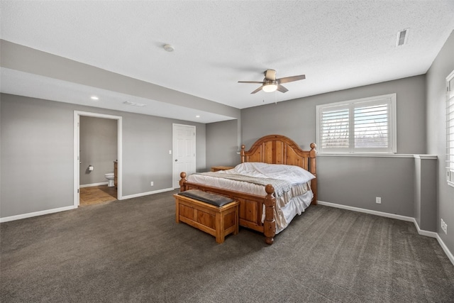 carpeted bedroom featuring visible vents, baseboards, a textured ceiling, and ensuite bathroom