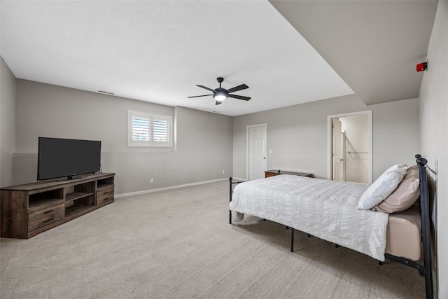 bedroom featuring baseboards, carpet flooring, and ceiling fan
