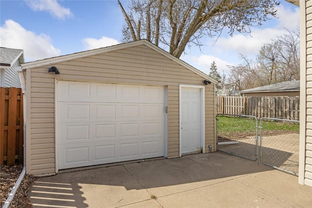 detached garage with fence