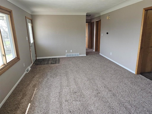 2704 Otis Rd SE, Cedar Rapids, IA 52403 - carpeted spare room with baseboards