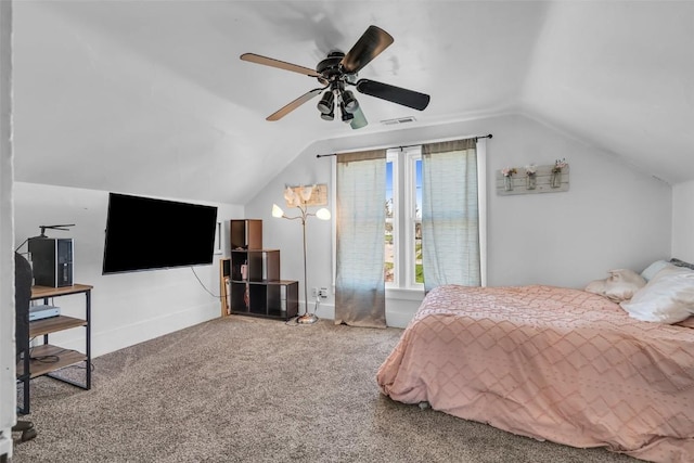 carpeted bedroom featuring visible vents, ceiling fan, and lofted ceiling
