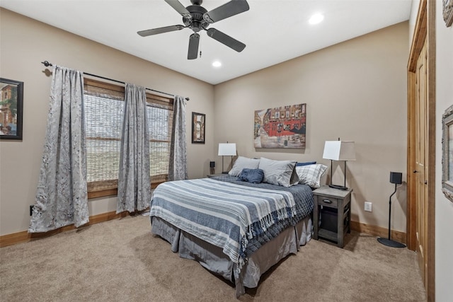 bedroom featuring recessed lighting, ceiling fan, light carpet, and baseboards