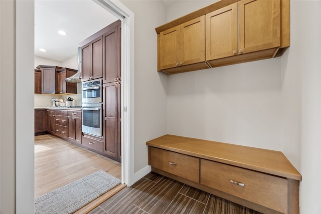 919 Camp Cardinal Rd, Iowa City, IA 52246 - mudroom with baseboards, dark wood-type flooring, and recessed lighting