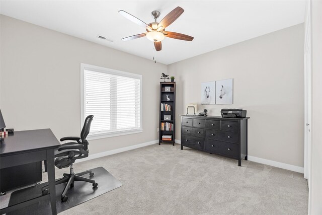 919 Camp Cardinal Rd, Iowa City, IA 52246 - office space with baseboards, visible vents, light colored carpet, and ceiling fan