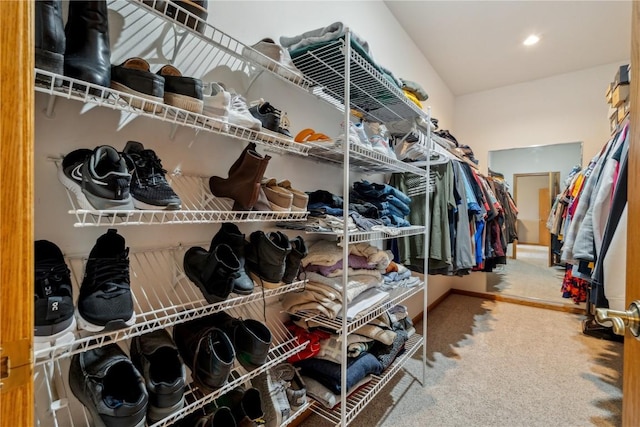 walk in closet featuring carpet