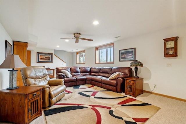 living area featuring a ceiling fan, recessed lighting, baseboards, and light carpet