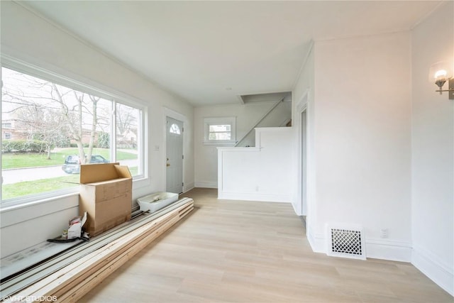 802 22nd Ave SW, Cedar Rapids, IA 52404 - entrance foyer featuring light wood finished floors and stairs