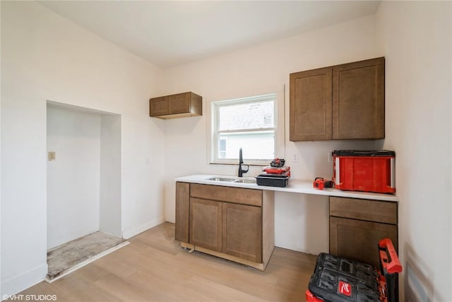 802 22nd Ave SW, Cedar Rapids, IA 52404 - kitchen featuring light wood-type flooring and light countertops