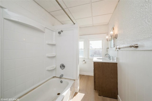 802 22nd Ave SW, Cedar Rapids, IA 52404 - bathroom featuring shower / bathtub combination, vanity, and wood finished floors