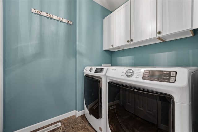 3211 35th Ave, Marion, IA 52302 - washroom featuring cabinet space, baseboards, visible vents, and washer and dryer