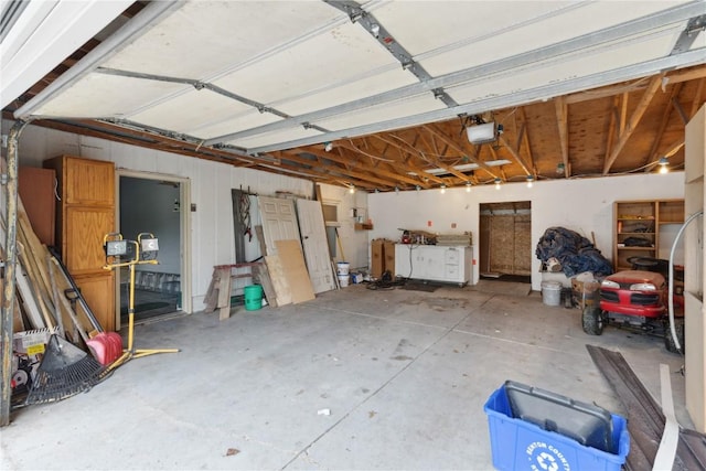 404 Main St, Shellsburg, IA 52332 - garage featuring a garage door opener