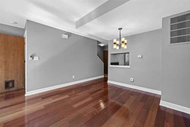 1156 Cambria Ct, Iowa City, IA 52246 - interior space with an inviting chandelier, visible vents, baseboards, and wood-type flooring