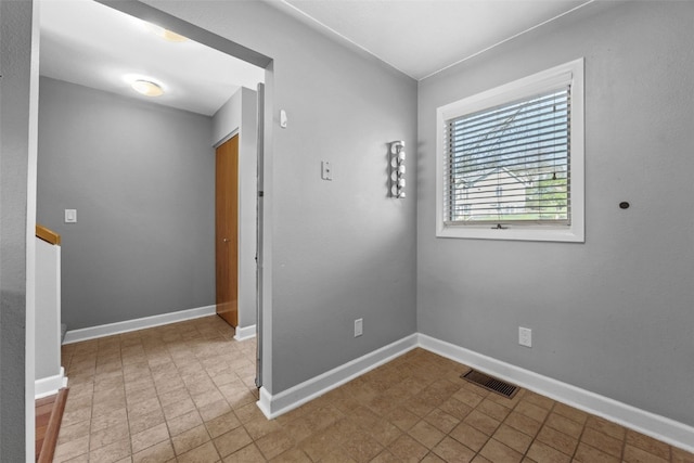 1156 Cambria Ct, Iowa City, IA 52246 - spare room with visible vents and baseboards