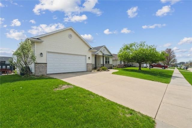 1835 Valentine Dr, Marion, IA 52302 - ranch-style home featuring brick siding, a garage, driveway, and a front yard