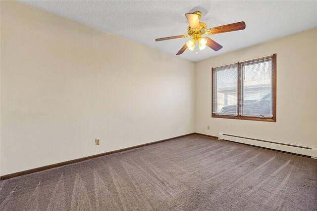 3212 Wilson Ave SW, Cedar Rapids, IA 52404 - spare room with a baseboard radiator, carpet flooring, ceiling fan, and baseboards
