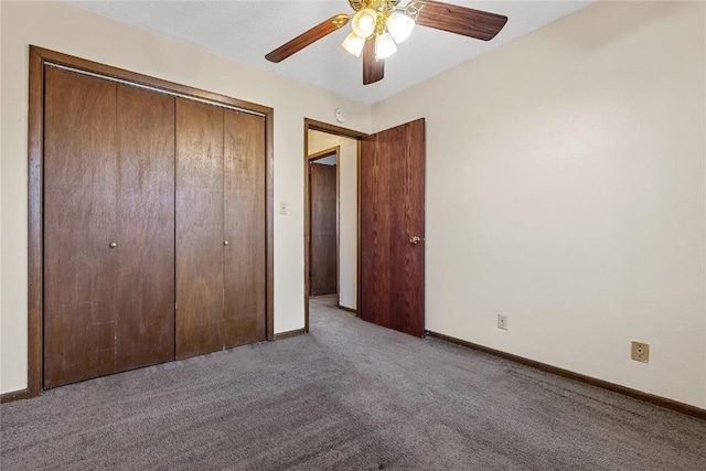 3212 Wilson Ave SW, Cedar Rapids, IA 52404 - unfurnished bedroom with carpet, a closet, and baseboards