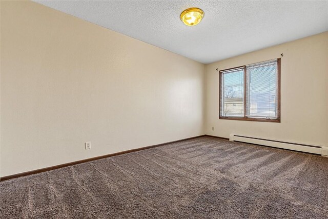 3212 Wilson Ave SW, Cedar Rapids, IA 52404 - carpeted empty room with baseboards, a textured ceiling, and baseboard heating