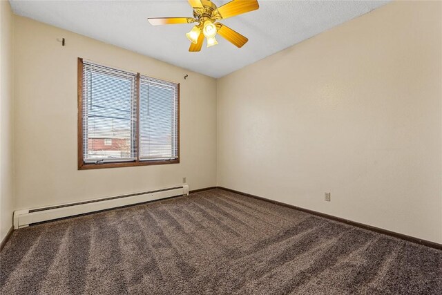3212 Wilson Ave SW, Cedar Rapids, IA 52404 - carpeted spare room featuring a baseboard radiator, baseboards, and ceiling fan