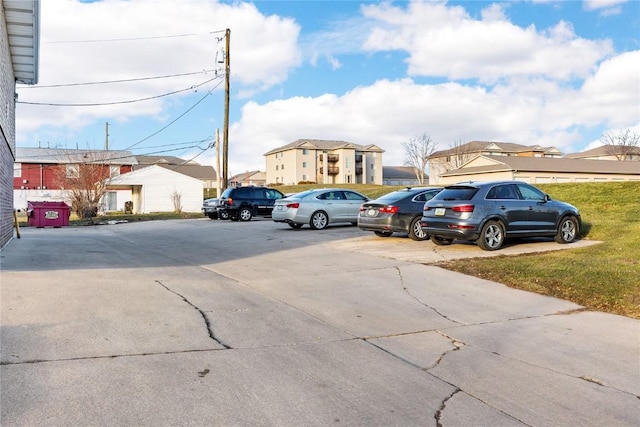 3212 Wilson Ave SW, Cedar Rapids, IA 52404 - uncovered parking lot with a residential view
