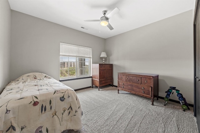 bedroom with visible vents, carpet flooring, ceiling fan, and baseboards