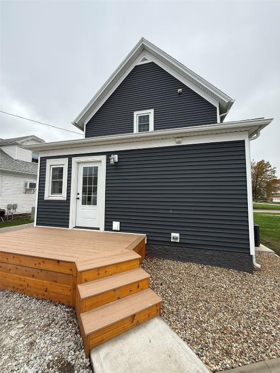 305 E 5th St, Vinton, IA 52349 - rear view of house featuring a deck