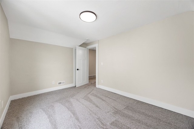 317 16th St NE, Cedar Rapids, IA 52402 - carpeted spare room featuring lofted ceiling and baseboards