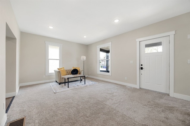 317 16th St NE, Cedar Rapids, IA 52402 - carpeted entrance foyer with baseboards and recessed lighting