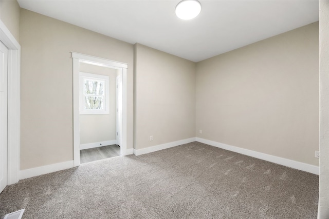 317 16th St NE, Cedar Rapids, IA 52402 - empty room with carpet flooring and baseboards