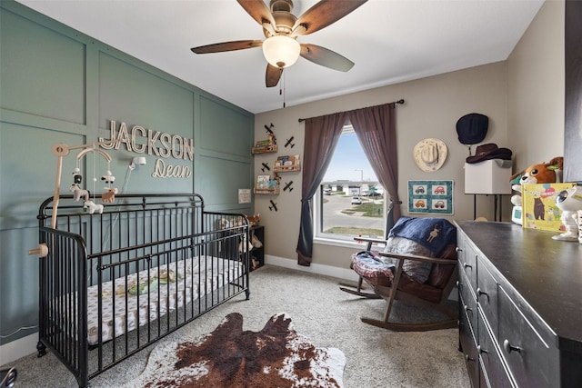 5116 Ruhd St SW, Cedar Rapids, IA 52404 - bedroom featuring baseboards, a ceiling fan, and carpet flooring