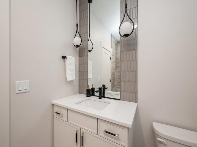 5497 Silver Ridge Rd, Marion, IA 52302 - bathroom with vanity and toilet