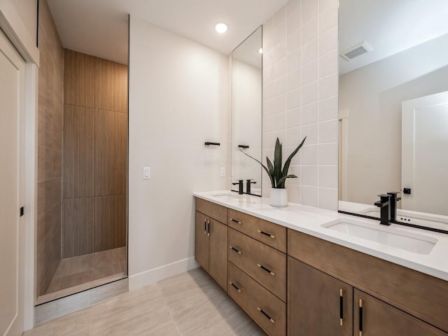 5497 Silver Ridge Rd, Marion, IA 52302 - full bath featuring visible vents, a sink, a walk in shower, and double vanity