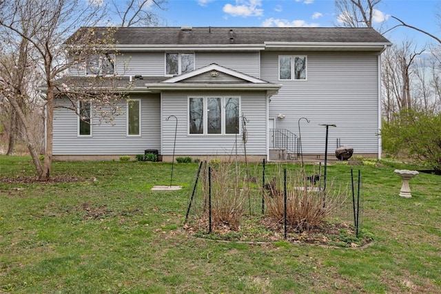 5823 Timber Creek Rd, Cedar Rapids, IA 52411 - back of house featuring a lawn