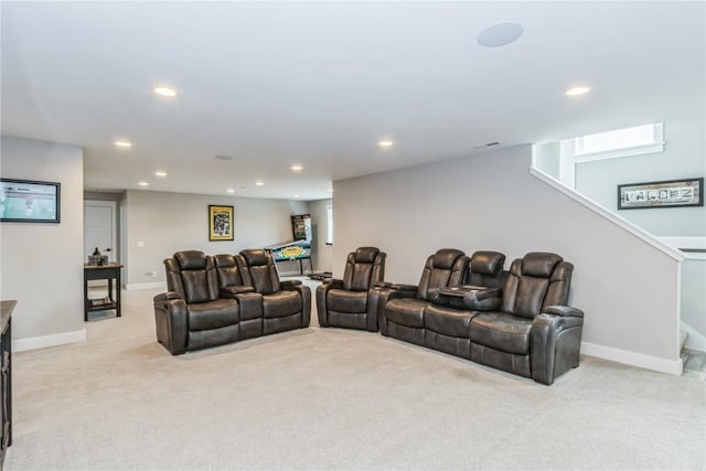 living room featuring recessed lighting, baseboards, light carpet, and stairway